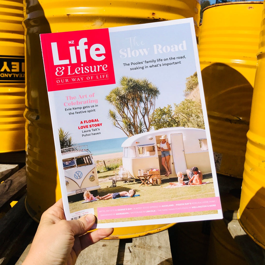 Front cover of NZ life and leisure magazine against yellow 44-gallon drums