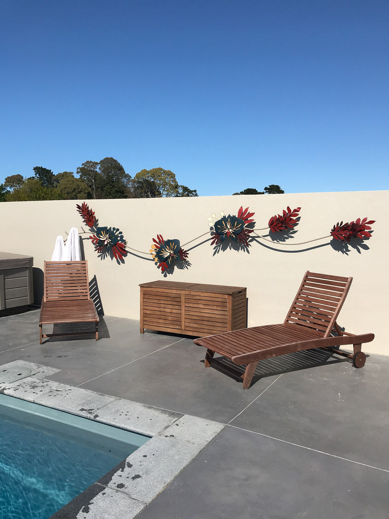 Poolside corsage metal wall sculpture Made from 44 gallon drums. repurposed material made by Metal Metcalfe METcALfe.